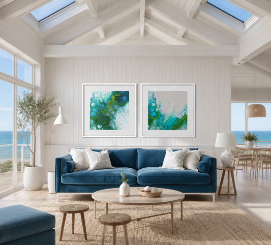Modern living room with blue sofa, coffee table, and ocean view